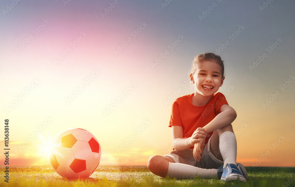 Child plays football