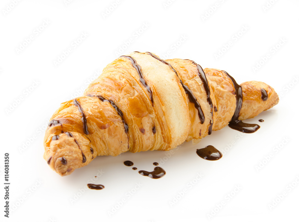 fresh croissant with hot chocolate on a white background