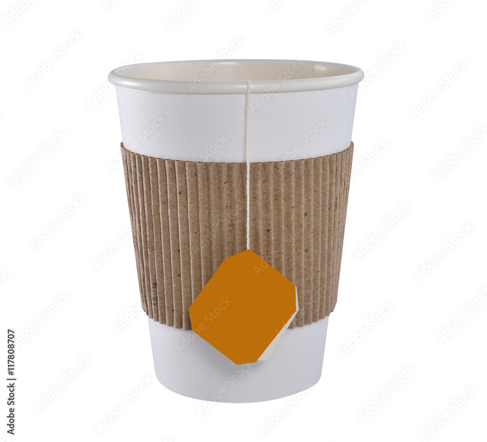 Paper cup of tea with tea bag (blank label) isolated on white background