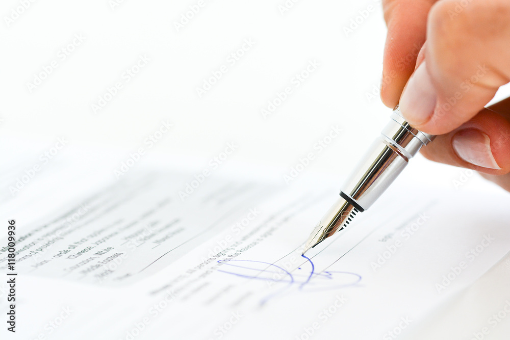 Sign a contract or agreement with a pen