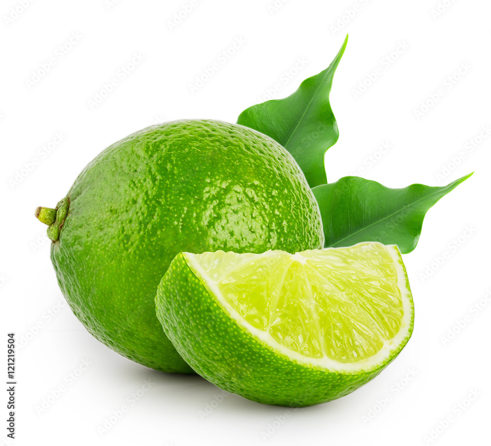 Whole and slice of lime with leaves