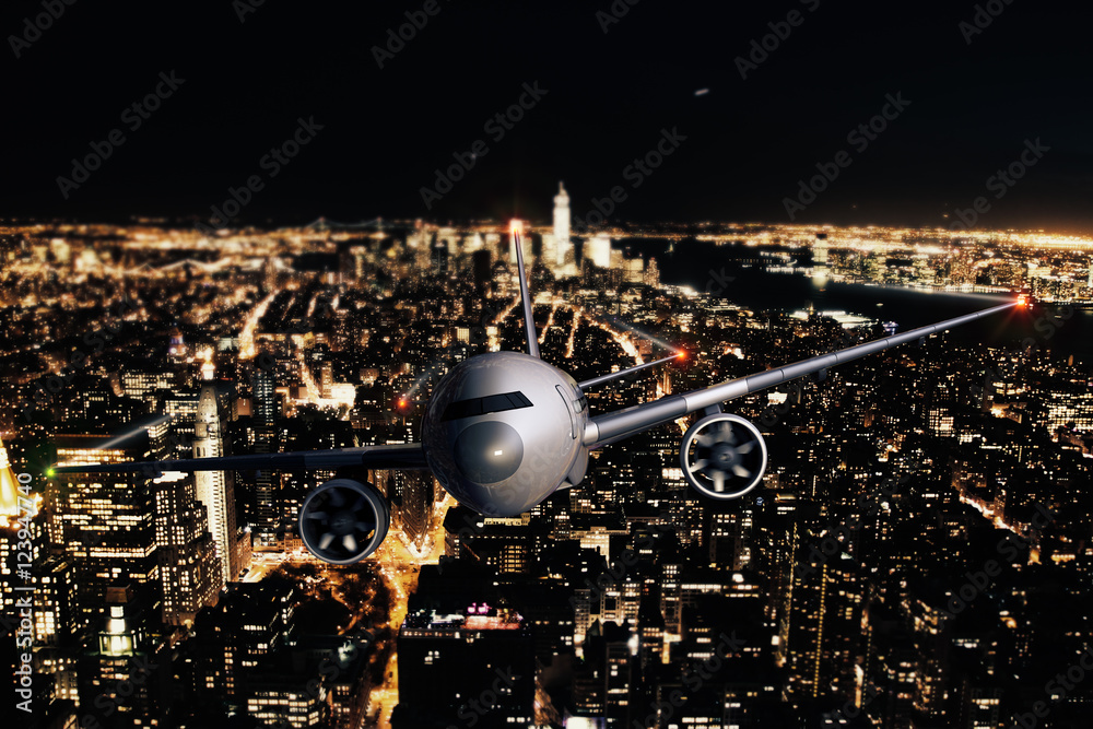 夜间城市背景下的飞机