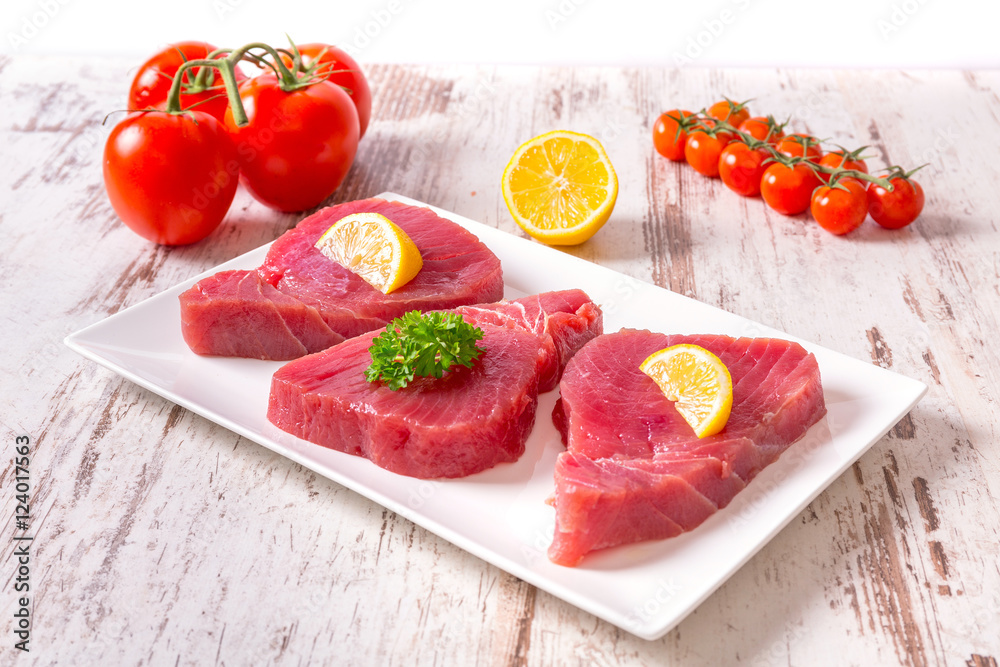 Fresh tuna steaks on the plate