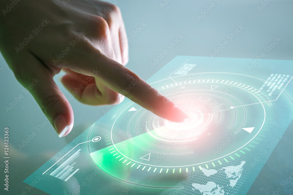 手触摸数据屏幕。未来主义的技术概念。