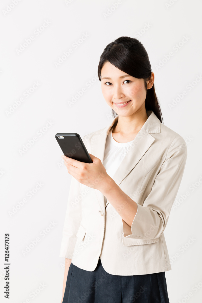 portrait of asian businesswoman using smart phone isolated on white background
