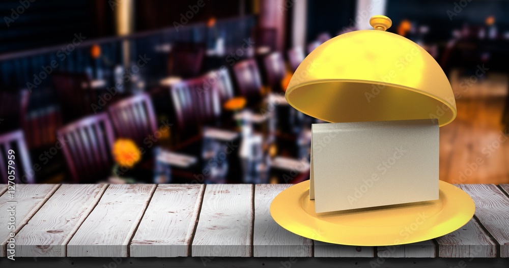 Composite image of golden serving platter with card