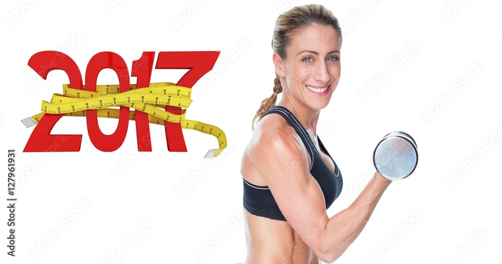 女性健美运动员用大哑铃锻炼的合成图像