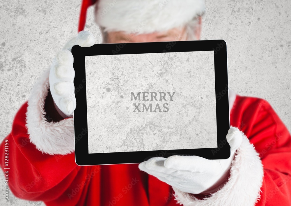 圣诞老人拿着数字平板电脑的手