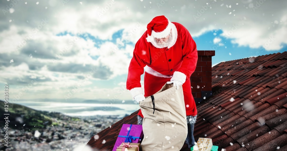 圣诞老人用袋子装礼盒的合成图像
