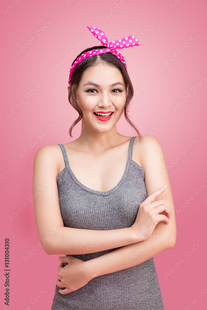 Portrait of beautiful pinup asian woman with vintage makeup and