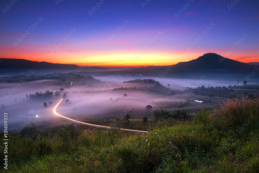 Beautiful twilight sky and misty landscape at Khao-kho mountain in morning.