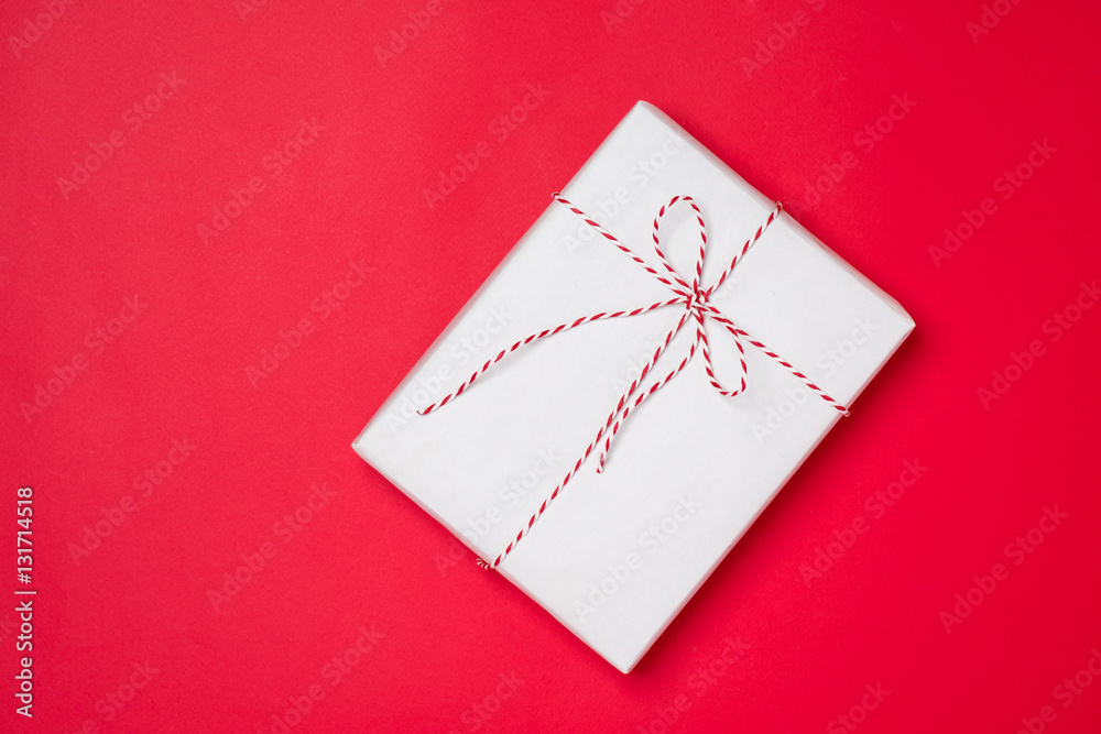 Happy birthday and gift box on red background