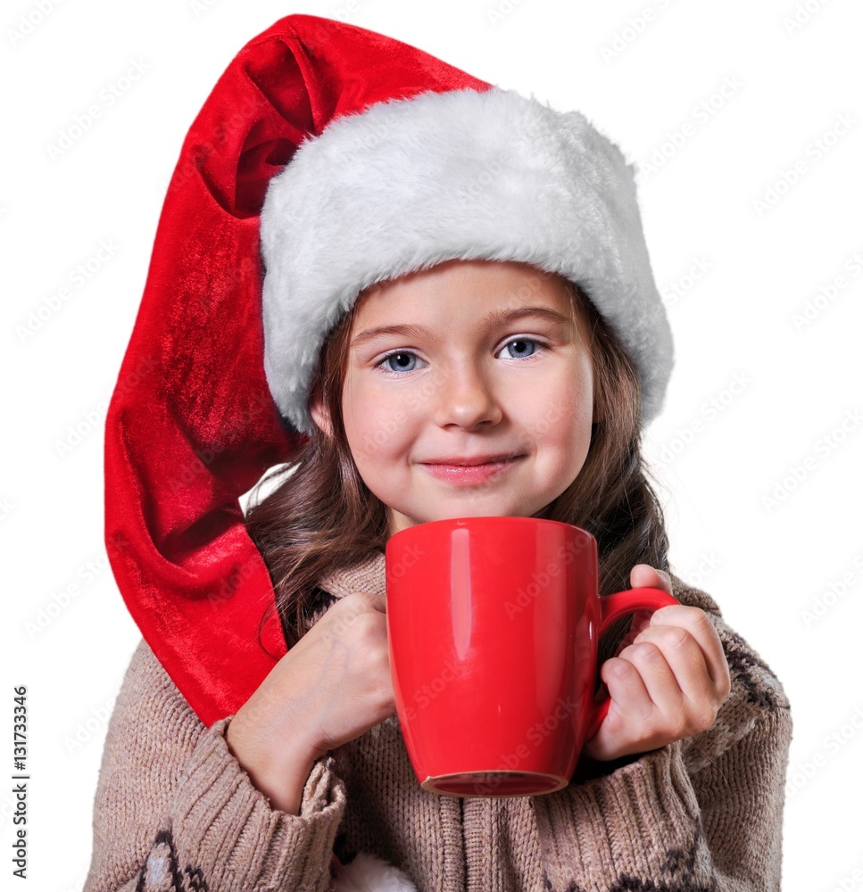 Child drinking hot chocolate.