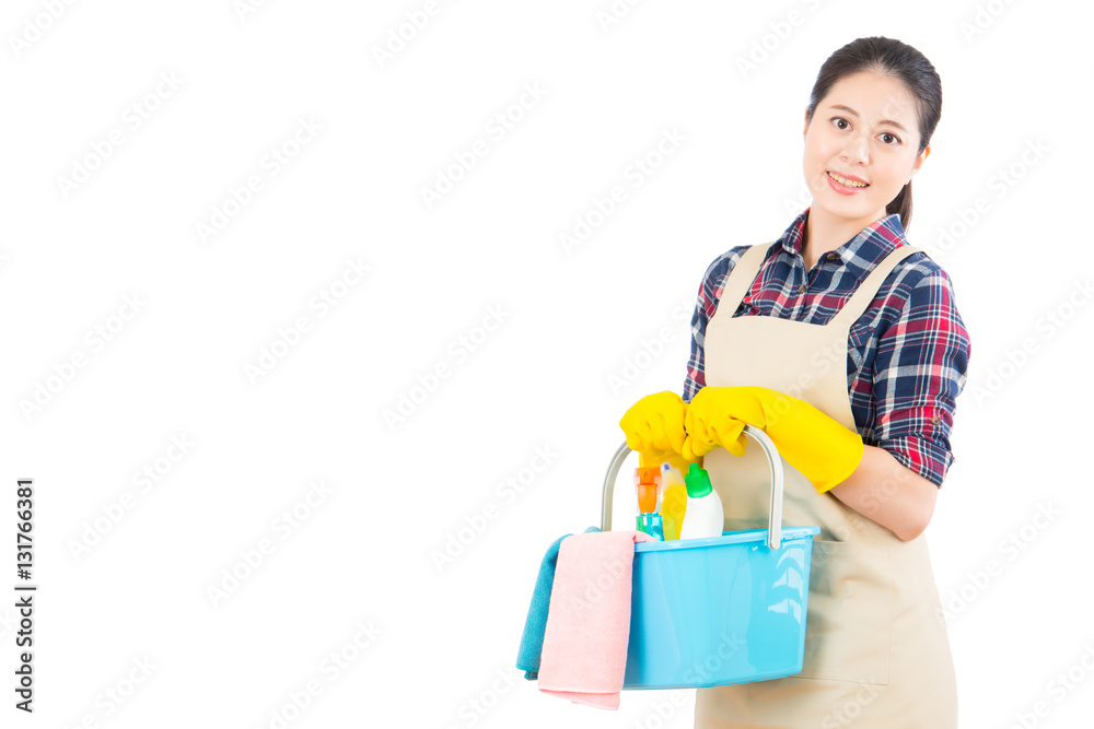 woman holding cleaning products in bucket
