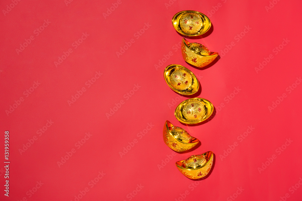 Chinese new year decorations on red background with gold spots.