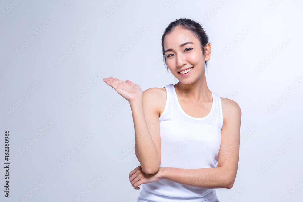 Beauty Woman face Portrait, girl points by hand, girl showing pr