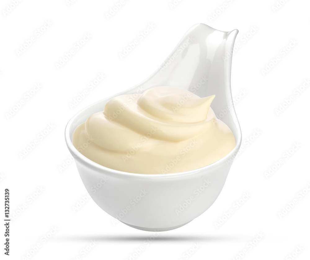 Mayonnaise sauce in bowl isolated on white background with clipping path