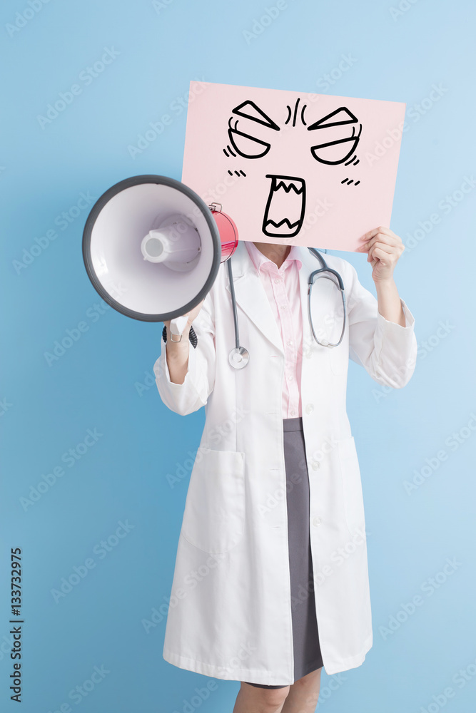 doctor take billboard and microphone