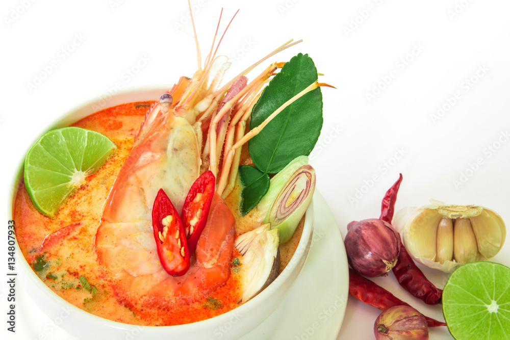 Close up Asian Spicy soup with shrimp in white bowl , famous Tha