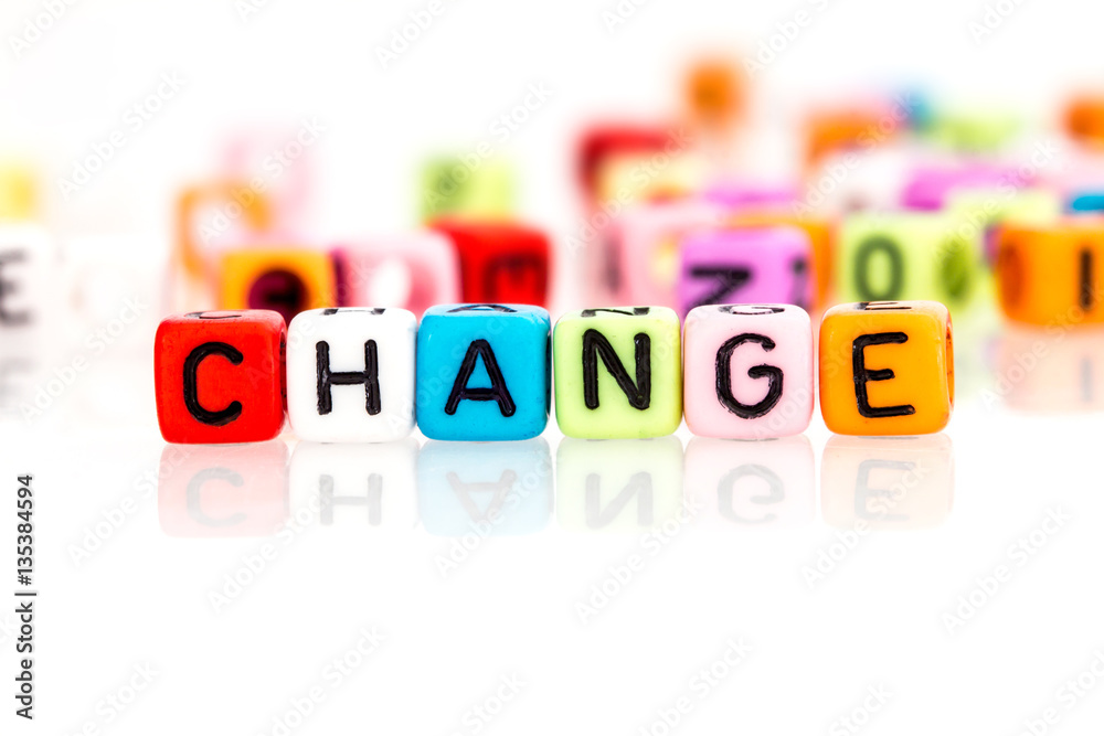 colorful word cube of change on white background