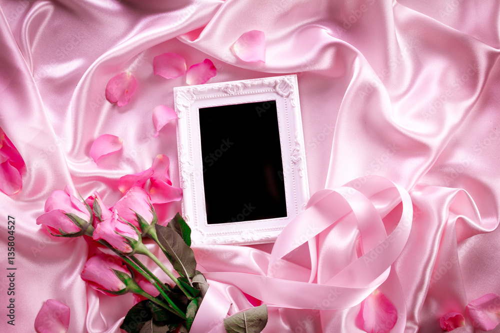 Empty photo frame with a bouquet sweet pink roses  petal 