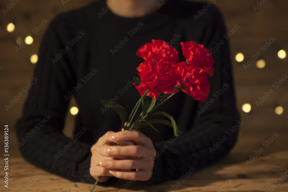 Women are receiving carnations on Mothers Day