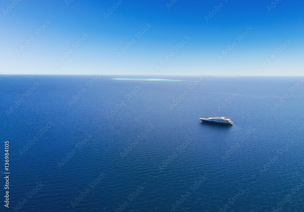 Aerial view of big yacht in sea
