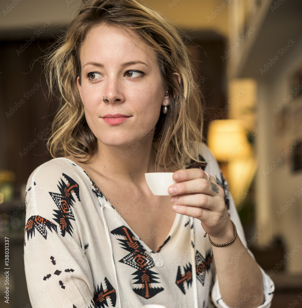 Young Woman Drinking Tea Concept
