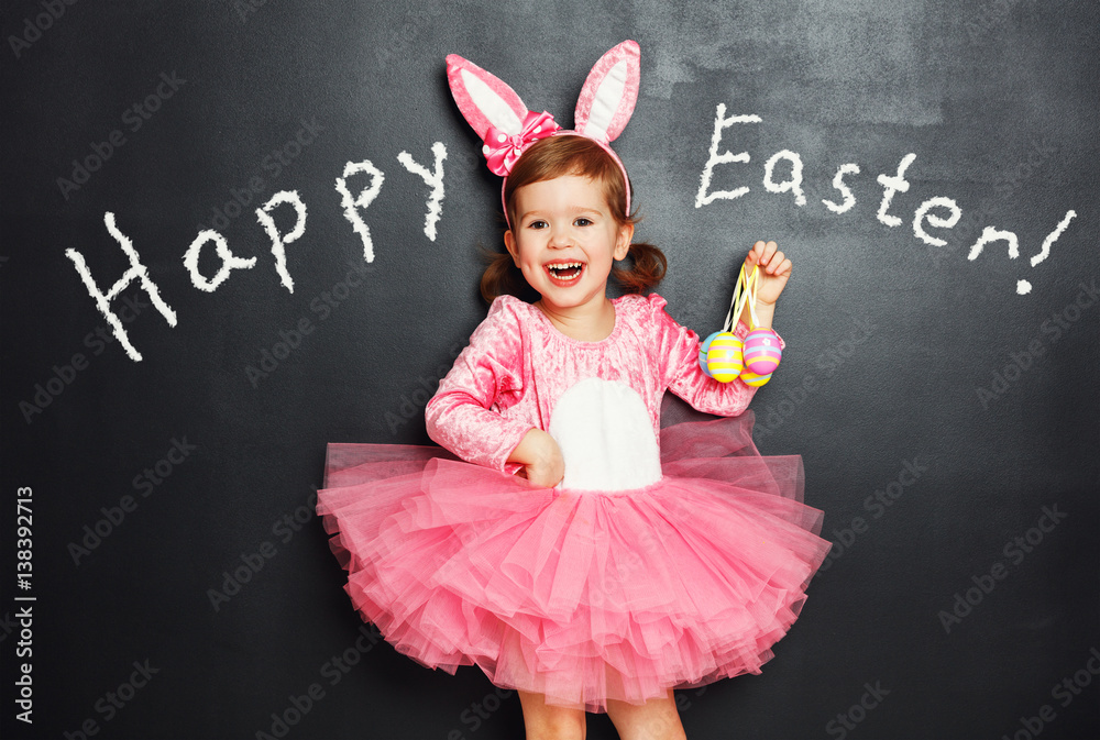 Happy easter! Child with bunny ears and eggs.
