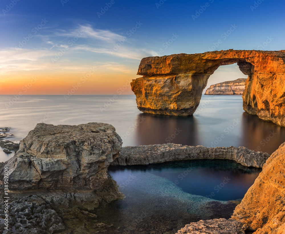 Gozo, Malta - Sunset at the beautiful Azure Window, a natural arch and famous landmark on the island
