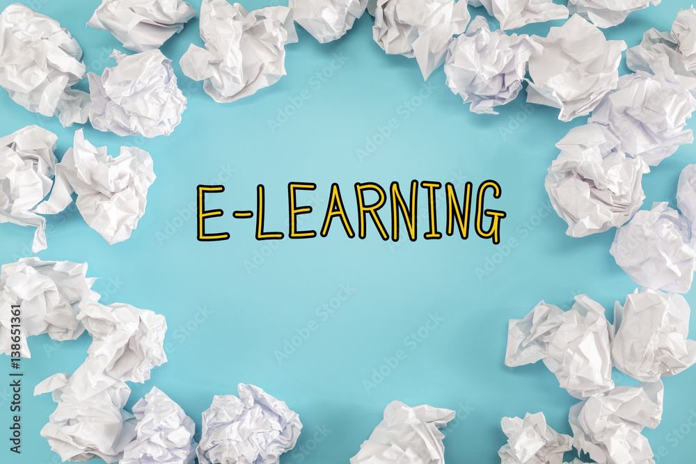 E-Learning text with crumpled paper balls