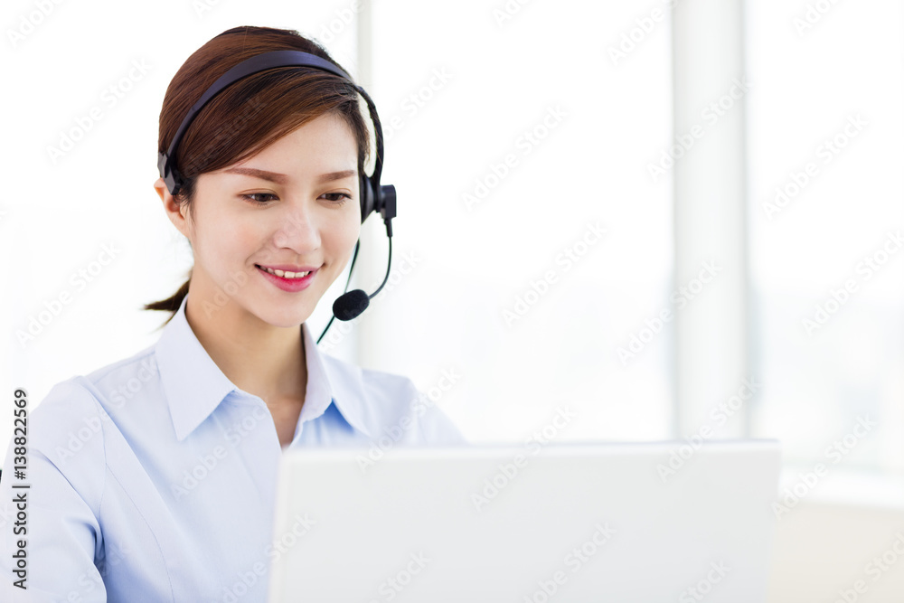 young business Woman wearing headset in office