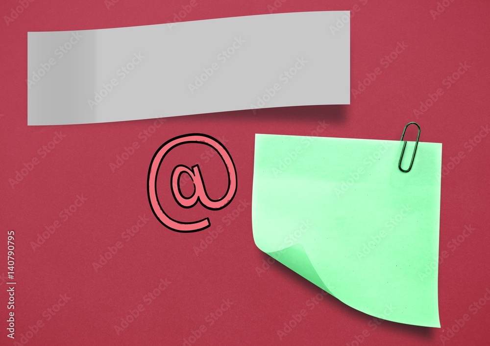 红色背景下的便笺和电子邮件图标