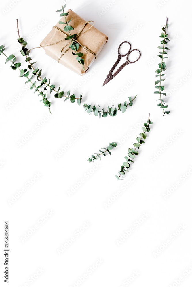 present design in box with flowers on white background top view mockup
