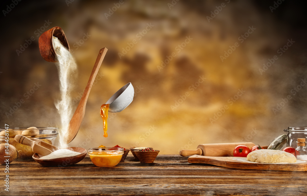 Dough preparation, baking ingredients placed on wooden table