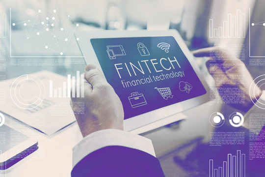 Financial technology fintech concept businessman using digital tablet