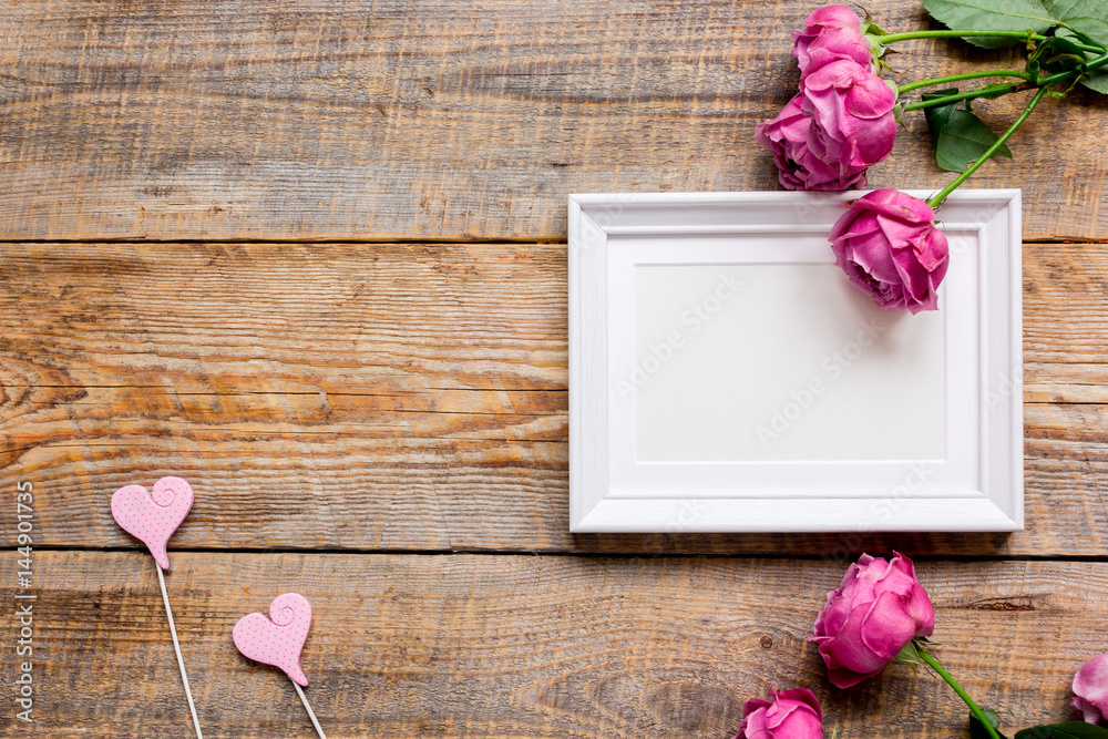 Mothers day gift with peony flowers and frame top view mockup