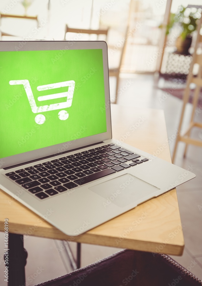 Laptop with Shopping trolley icon