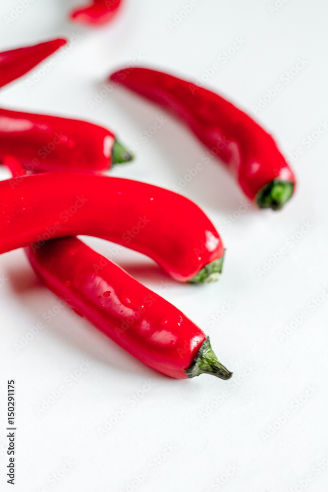 spicy food cooking with red chili white table background