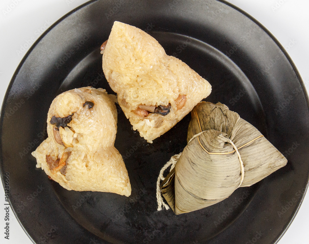 Chinese traditional food zongzi,glutenous rice dumplings, dragon boat festival food isolated on whit