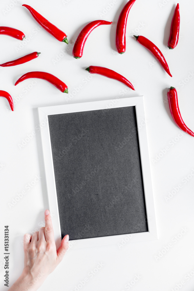 red food with chili pepper and frame top view space for text