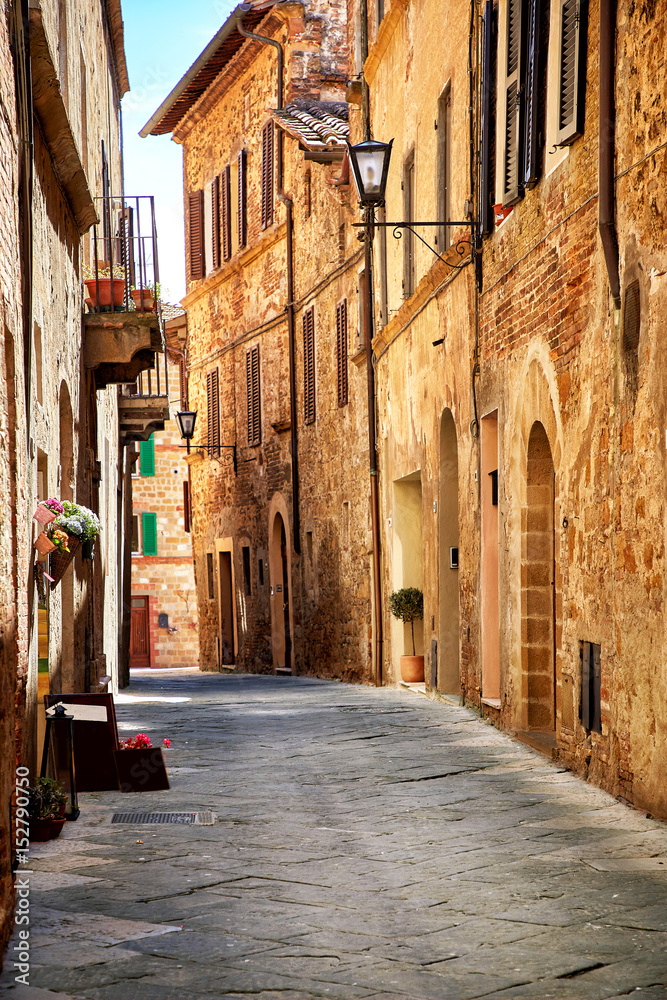Narrow town street in Pienza, Italy