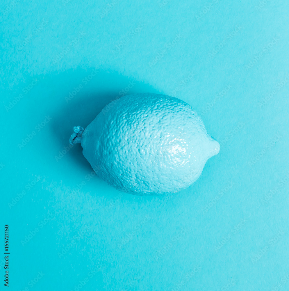 Painted fruit on a blue background