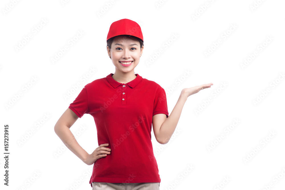 Portrait of delivery woman show something isolated on white background.