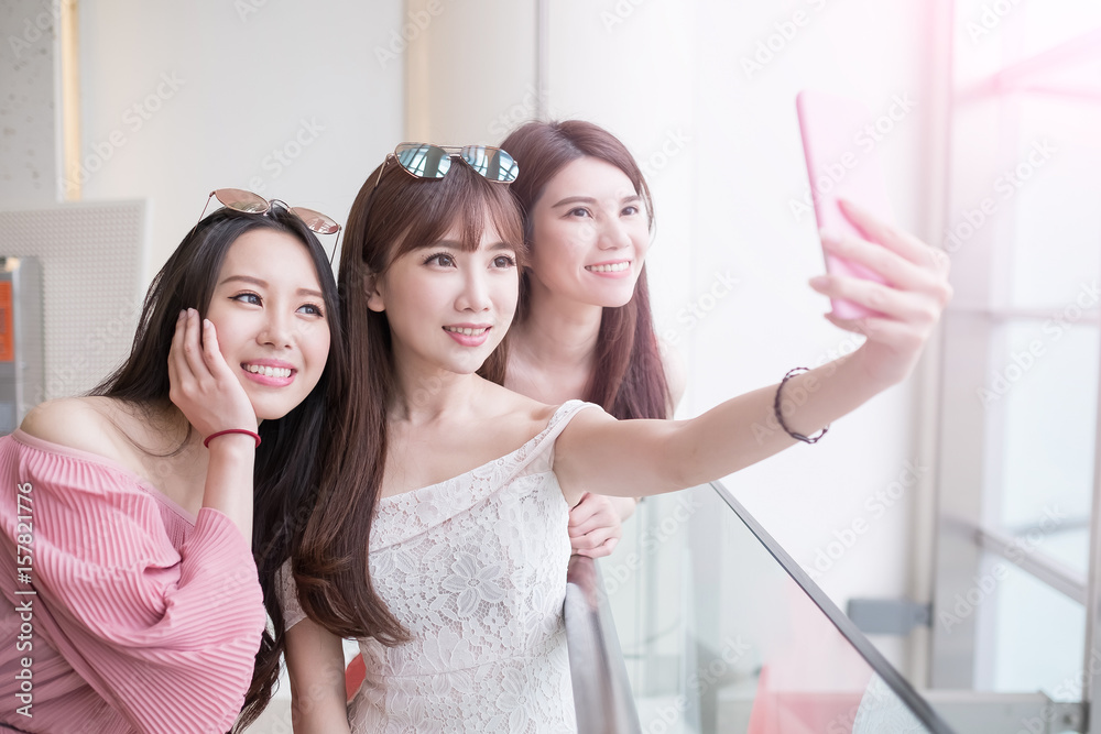 women selfie in mall
