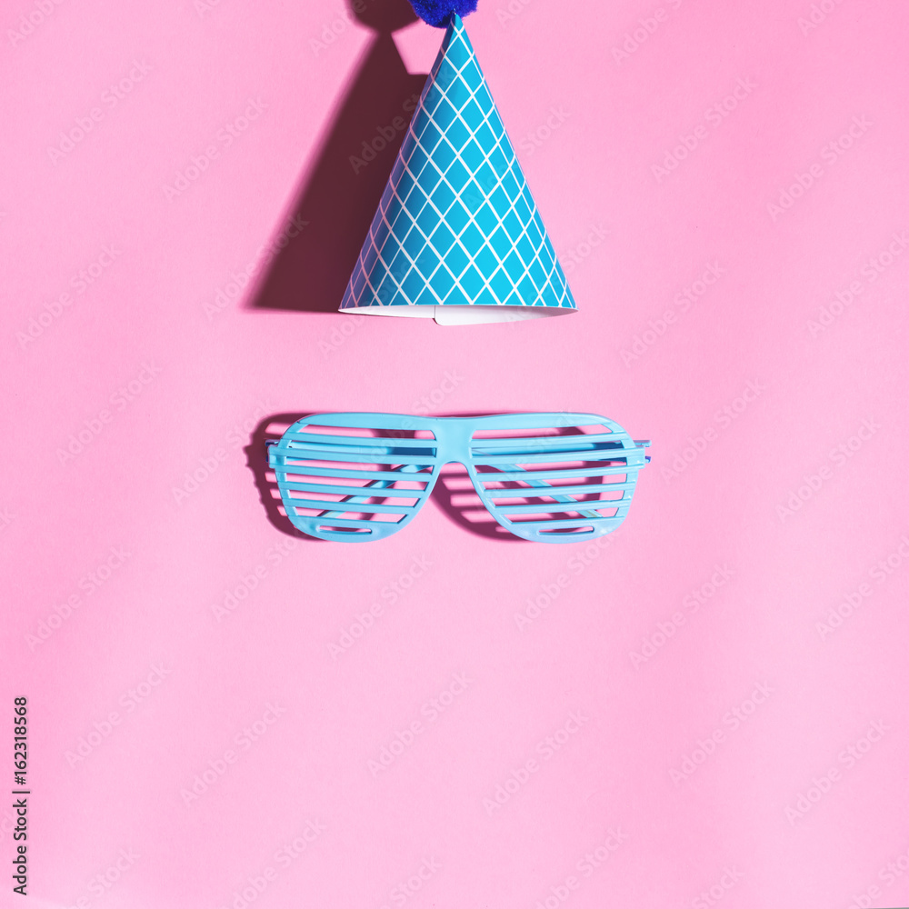 Party objects theme on a pink background