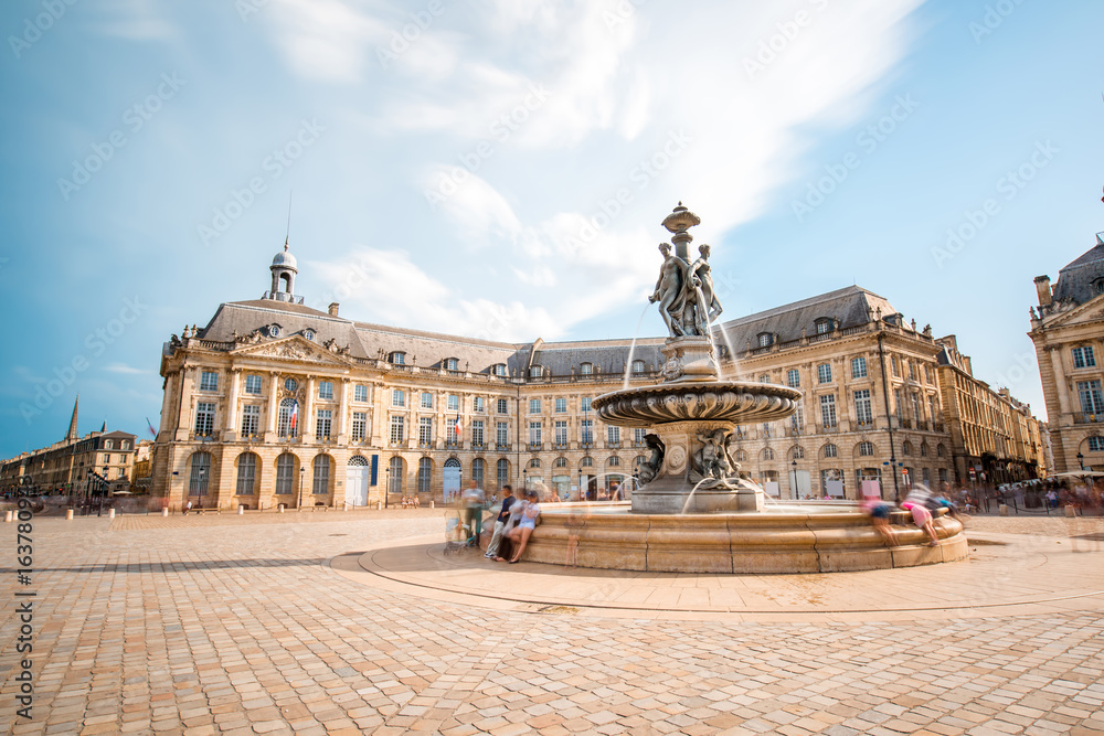 View on the famous La Bourse square with fountain in Bordeaux city, France. Long exposure image tech