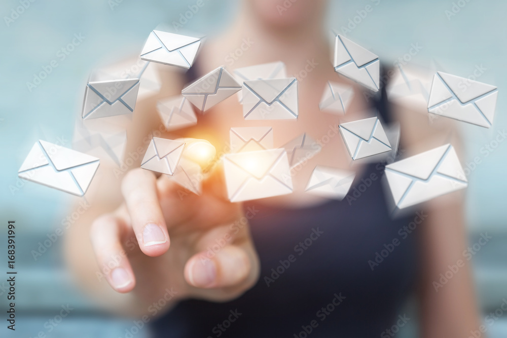 Businesswoman holding and touching 3D rendering flying email