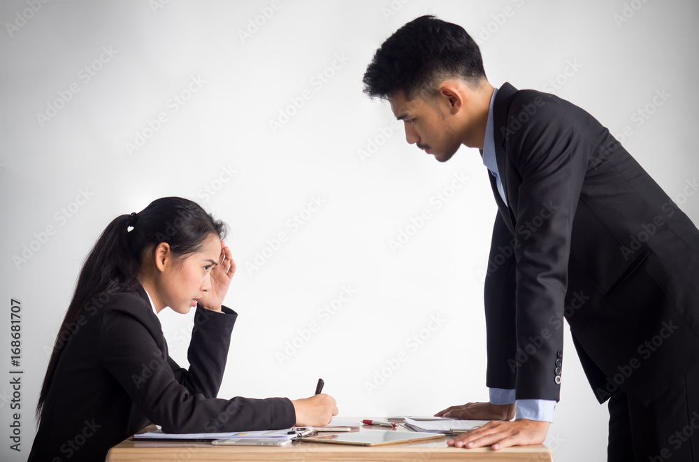 Aggressive/angry boss complaining asian business woman(casual uniform) in cafe office