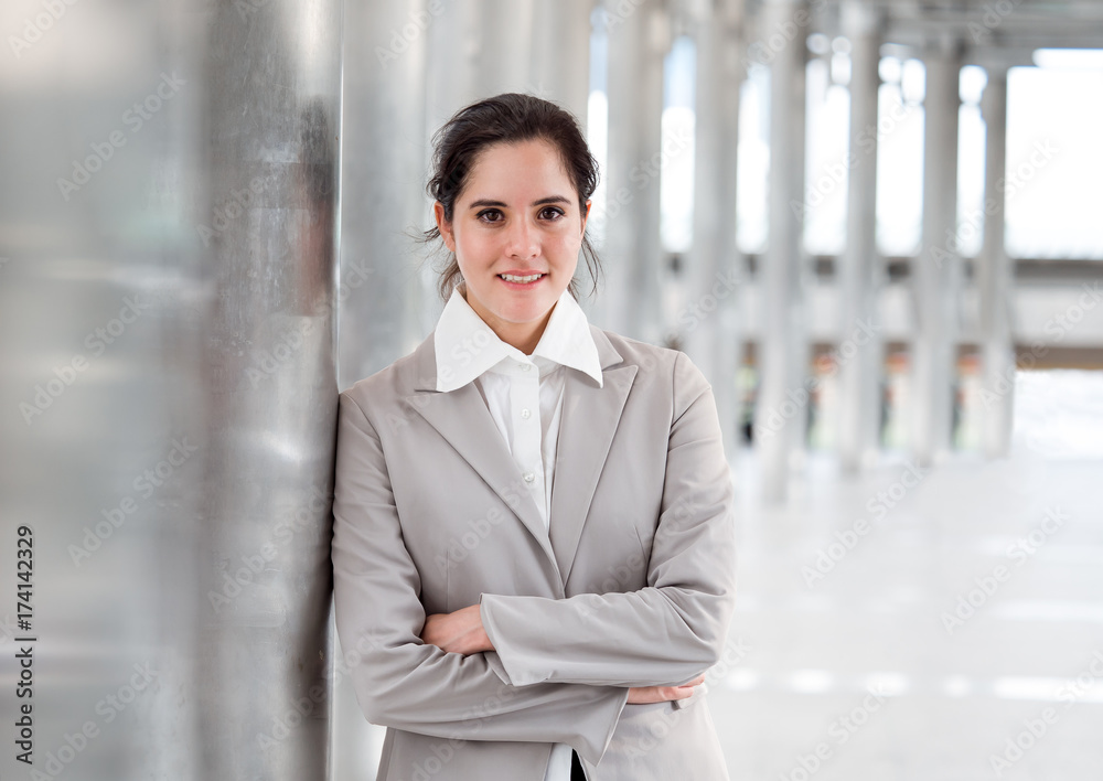 Portrait young Caucasian businesswoman, smart employee, wear suit and cross arm with copy space